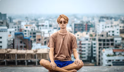 The guy meditates on the roof